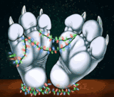 A dragon's paws with holiday lights draped between them.