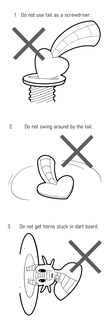 A series of guidelines for dragon care from an instruction manual.
1. Do not use tail as a screwdriver, with a diagram depicting the heart tip of a tail being used exactly that way with a big X next to it.
2. Do not swing round by the tail, with a diagram showing it being swung.
3. Do not get horns stuck in dart board, with a diagram of the dragon hanging from the dartboard, looking nonplussed.