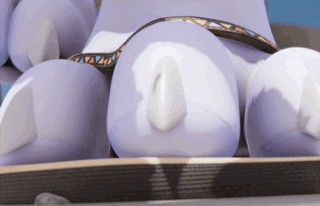 A close up view of dragon paws in a sandal sitting outside; the toes lifting up and thumping down.