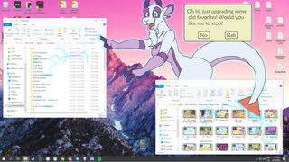 A dragoat on a Windows 10 desktop, climbing over mountains that are part of the desktop background, changing files in a media family to be about goats or Stephanie. A Clippy like dialogue box is displayed 'Oh hi, just upgrading some old favourites! Would you like me to stop?' with options of 'No' and 'Nah'
