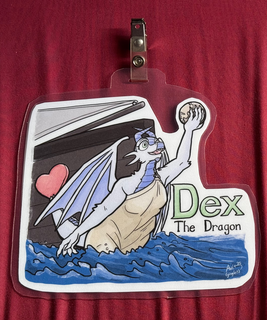 A dragon as a ship's figurehead, holding a globe.